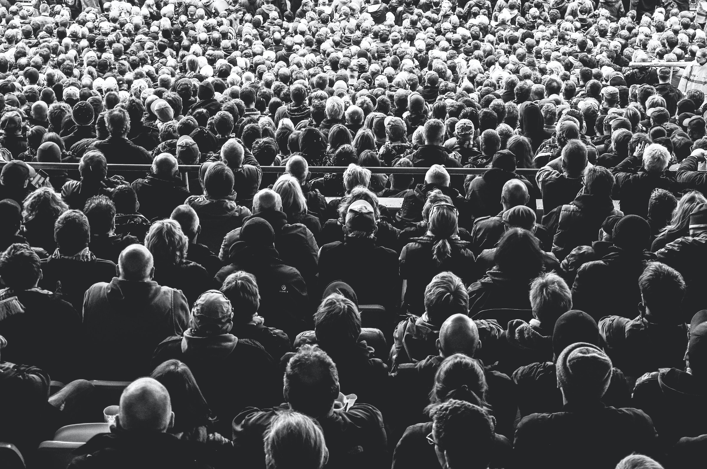 A photo of an audience - Photo by @davideragusa on Unsplash (unsplash.com/@davideragusa)