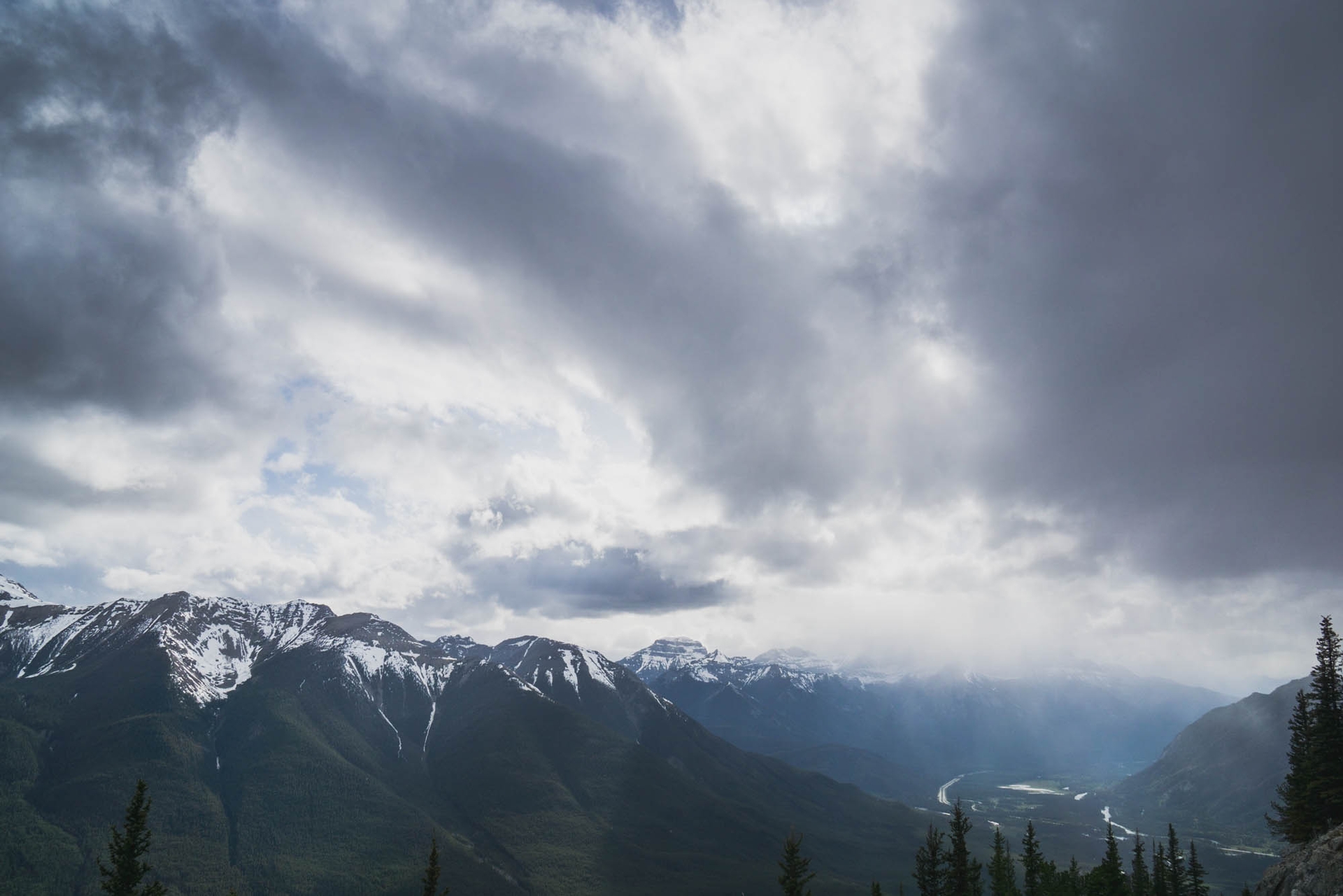 A view of the Canadian Rocky Mountains at the top of the Banff Gondola in Alberta, Canada